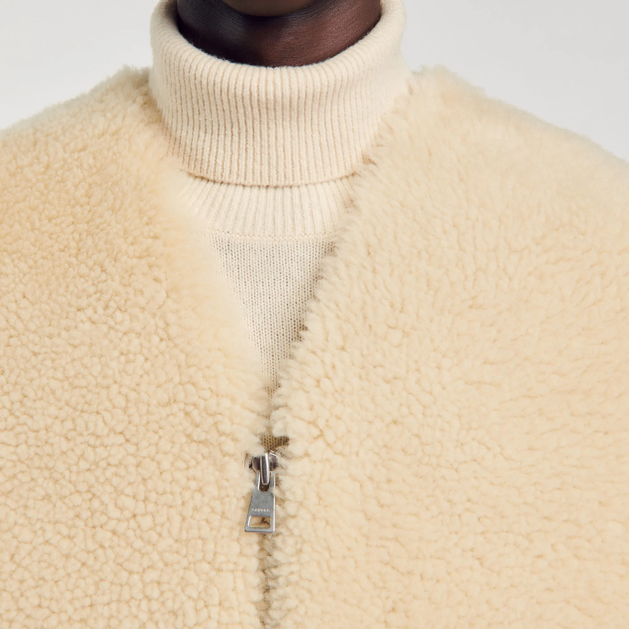 Cardigan smanicato montone scamosciato