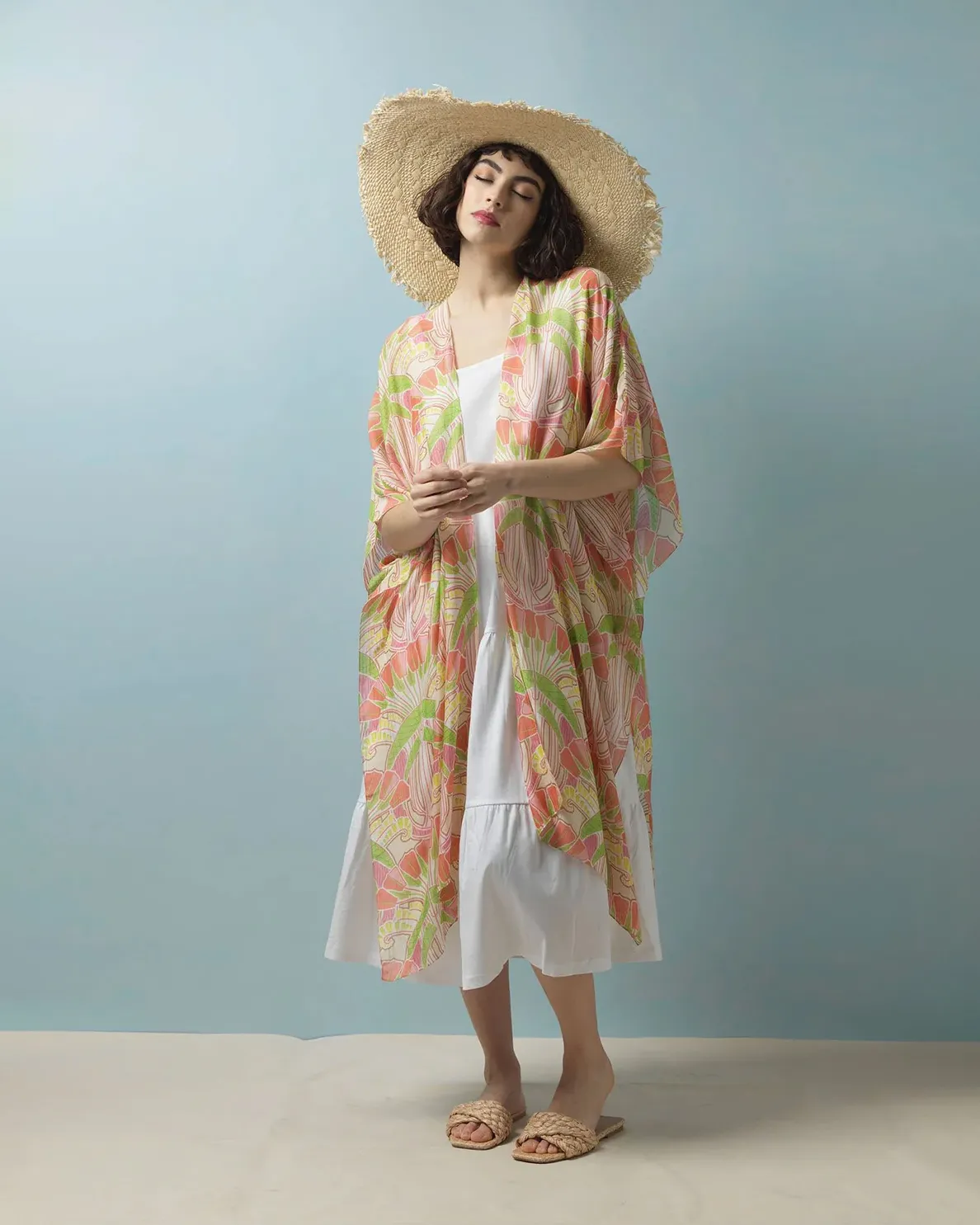 Kimono media lunghezza giallo verde e rosa a fantasia fiori di ispirazione art déco con spacchi laterali