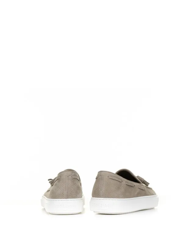Moccasin in beige suede and rubber sole