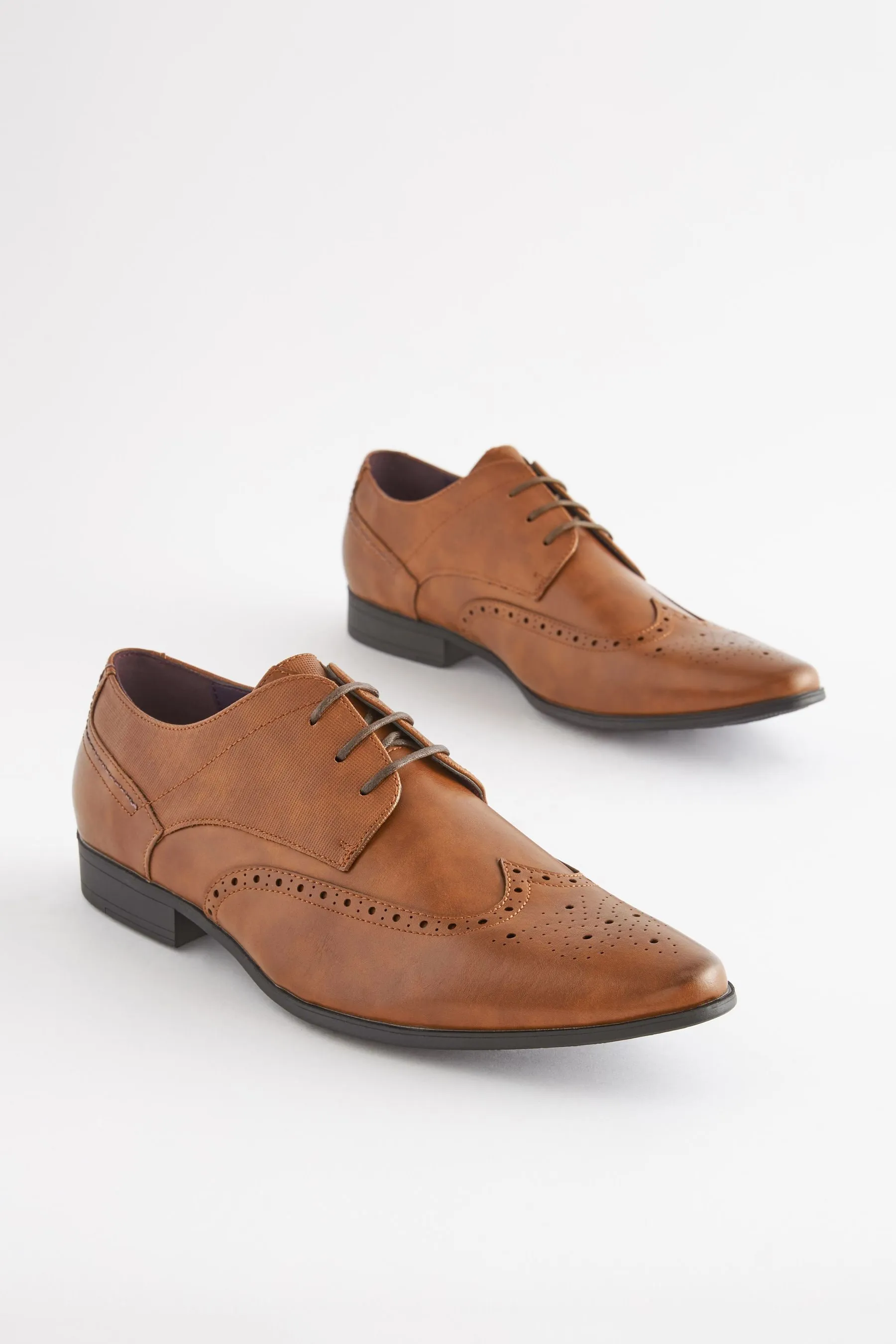 Scarpe brogue a pianta larga