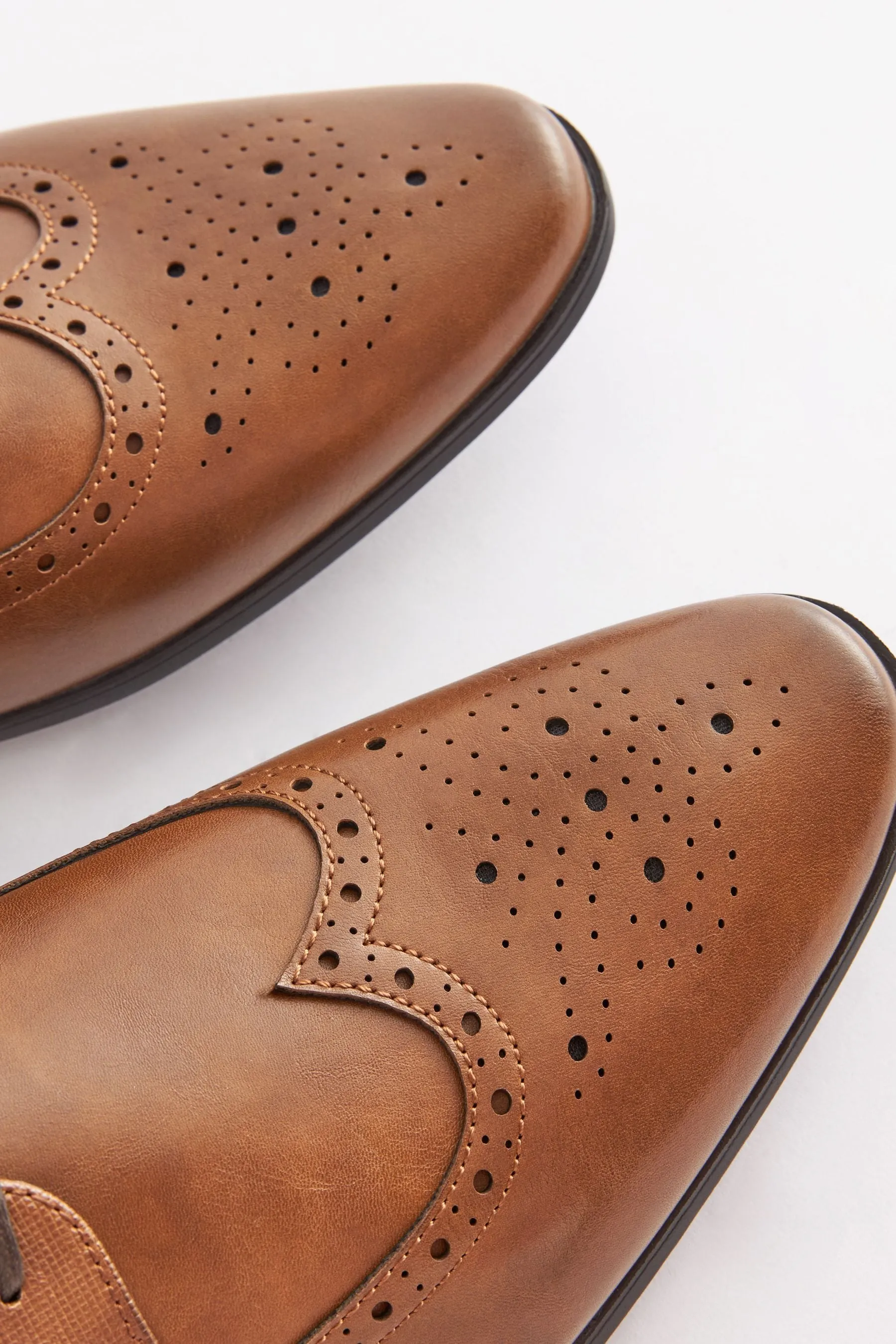 Scarpe brogue a pianta larga