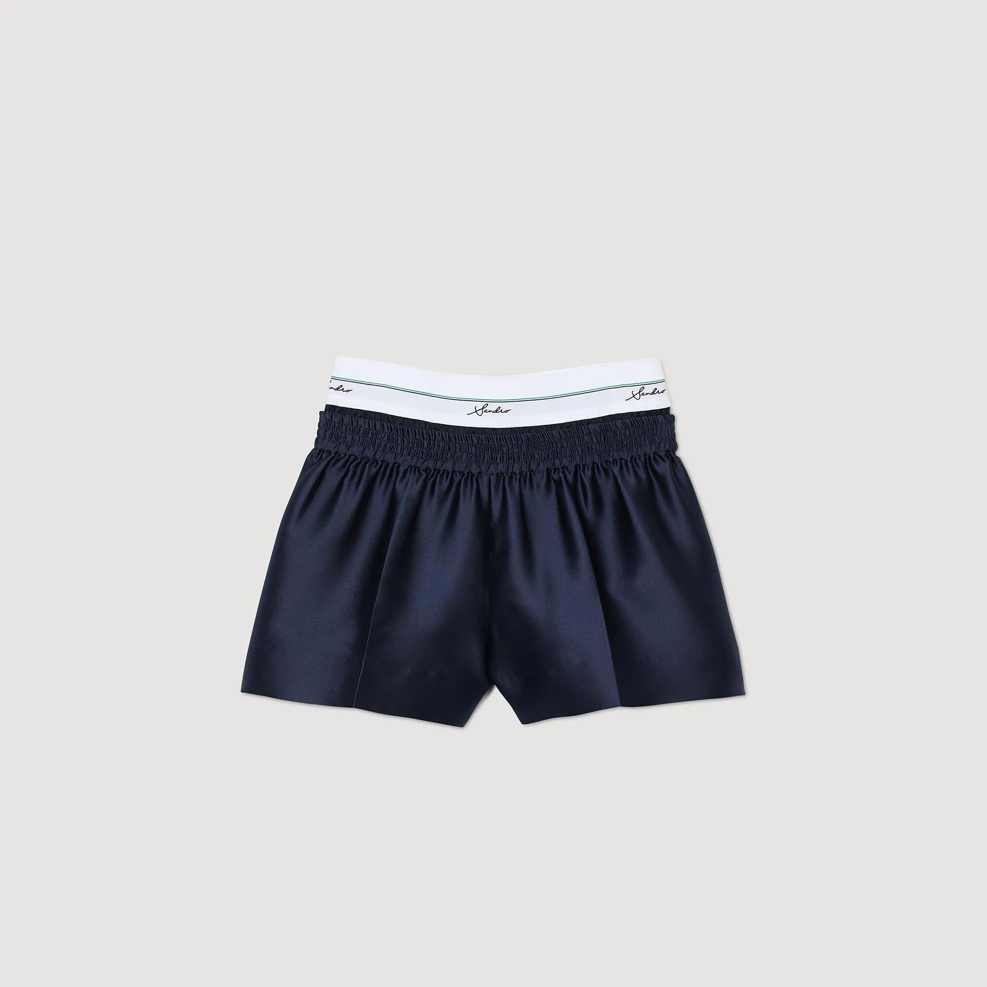 Shorts tipo 2 in 1 in raso