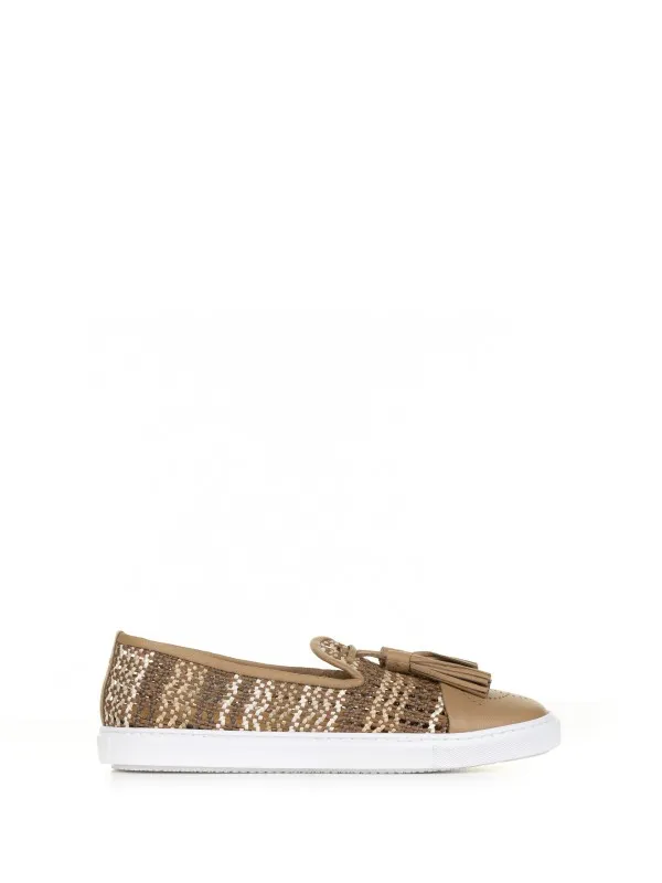 Slip-ons in woven leather with tassels